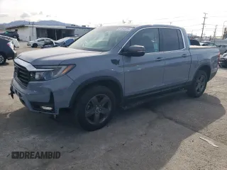 2023 Honda Ridgeline RTL z VIN 5FPYK3F58PB030173, wystawiony jako Copart lot #51543395 z przebiegiem 32 457 mil mil oraz Czysty tytuł • Clean title. Historia ofert i sprzedaży dostępna na DreamBid. Obrazek 1.