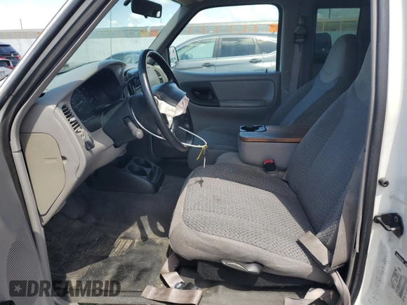 1999 Ford Ranger XL with VIN 1FTYR14V7XPA65093, listed as a Copart auction lot 51599395 with 165,252 mi miles and Salvage Title. Bid and sale history available at carsss.com. Image 7.