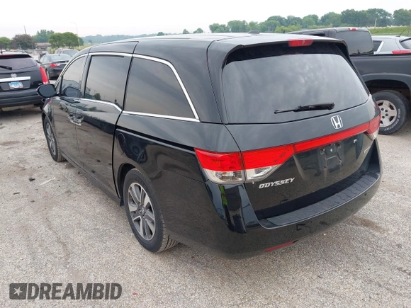 2015 Honda Odyssey Touring Elite with VIN 5FNRL5H97FB124565, listed as a IAAI auction lot 42358412 with 206,444 mi miles and . Bid and sale history available at DreamBid. Image 3.
