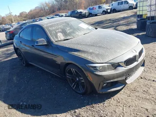 2019 BMW 4 Series 440i xDrive with VIN WBA4J7C52KBM75345, listed as a IAAI auction lot 40613703 with 31,402 mi miles and . Bid and sale history available at carsss.com. Image 1.