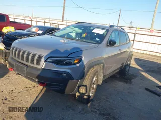 2022 Jeep Cherokee Trailhawk with VIN 1C4PJMBX3ND506936, listed as a IAAI auction lot 41419747 with 26,699 mi miles. Bid and sale history available at carsss.com. Image 2.