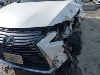 2018 Lexus RX 350L Premium z VIN JTJDZKCAXJ2005488, wystawiony jako IAAI lot #41509043 z przebiegiem 151 814 mil mil oraz . Historia ofert i sprzedaży dostępna na DreamBid. Obrazek 6.