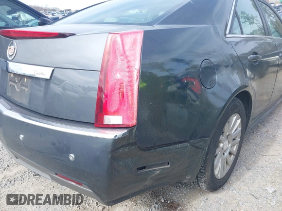 2012 Cadillac CTS Luxury with VIN 1G6DE5E58C0143175, listed as a IAAI auction lot 41612743 with 148,764 mi miles and . Bid and sale history available at DreamBid. Image 6.