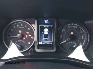 2023 Toyota Tacoma SR5 z VIN 3TMDZ5BN4PM148379, wystawiony jako IAAI lot #41547628 z przebiegiem 30 001 mil mil oraz . Historia ofert i sprzedaży dostępna na DreamBid. Obrazek 16.