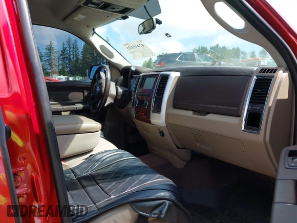 2009 Dodge 1500 Laramie z VIN 1D3HV13T79S708304, wystawiony jako IAAI lot #42445125 z przebiegiem 179 069 mil mil oraz . Historia ofert i sprzedaży dostępna na DreamBid. Obrazek 5.