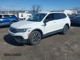 2024 Volkswagen Tiguan S with VIN 3VVFB7AX7RM063715, listed as a IAAI auction lot 41974650 with 23,374 mi miles and . Bid and sale history available at DreamBid. Image 2.