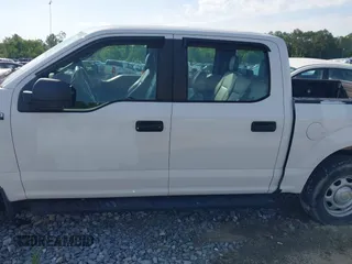 2019 Ford F-150 XL with VIN 1FTEW1CB3KKD58854, listed as a IAAI auction lot 42119966 with 91,198 mi miles and . Bid and sale history available at DreamBid. Image 14.