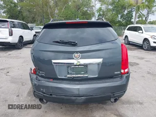 2015 Cadillac SRX with VIN 3GYFNAE30FS569009, listed as a IAAI auction lot 41718522 with 104,448 mi miles and . Bid and sale history available at DreamBid. Image 16.