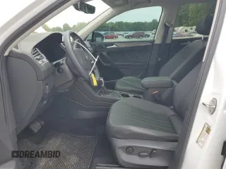 2023 Volkswagen Tiguan SE with VIN 3VVNB7AX9PM029204, listed as a Copart auction lot 58340285 with 13,693 mi miles and Salvage title. Bid and sale history available at DreamBid. Image 7.