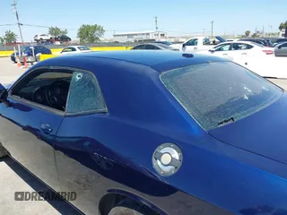 2013 Dodge Challenger R/T z VIN 2C3CDYBT9DH565280, wystawiony jako IAAI lot #42315527 z przebiegiem 128 638 mil mil oraz . Historia ofert i sprzedaży dostępna na DreamBid. Obrazek 6.
