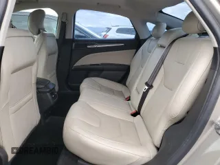 2015 Ford Fusion Titanium Hybrid with VIN 3FA6P0RUXFR115229, listed as a Copart auction lot 54629355 with 76,671 mi miles and Salvage title. Bid and sale history available at DreamBid. Image 10.