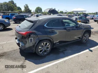 2022 Lexus UX 250h F Sport with VIN JTHE9JBH2N2056763, listed as a Copart auction lot 70052364 with 50,802 mi miles and Salvage Title. Bid and sale history available at DreamBid. Image 3.