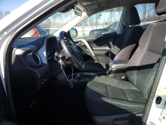 2018 Toyota RAV4 XLE with VIN 2T3WFREV2JW454202, listed as a Copart auction lot 41599855 with 144,442 mi miles and Salvage title. Bid and sale history available at DreamBid. Image 7.