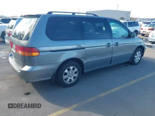 2002 Honda Odyssey EX z VIN 5FNRL186X2B014652, wystawiony jako IAAI lot #41950225 z przebiegiem 286 959 mil mil oraz . Historia ofert i sprzedaży dostępna na DreamBid. Obrazek 4.