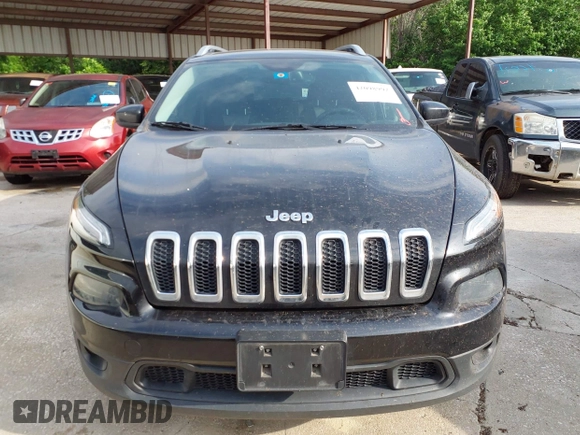 2014 Jeep Cherokee Latitude with VIN 1C4PJMCS5EW294743, listed as a IAAI auction lot 42098992 with 185,814 mi miles. Bid and sale history available at carsss.com. Image 13.