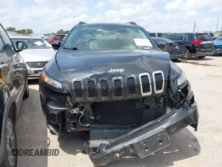 2016 Jeep Cherokee Sport with VIN 1C4PJLAB5GW297349, listed as a IAAI auction lot 42367544 with 142,930 mi miles and . Bid and sale history available at DreamBid. Image 12.