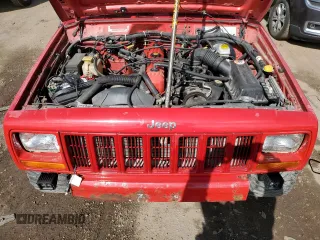 2000 Jeep Cherokee with VIN 1J4FF48S0YL113246, listed as a Copart auction lot 51861455 with 180,965 mi miles and Clean title. Bid and sale history available at DreamBid. Image 11.