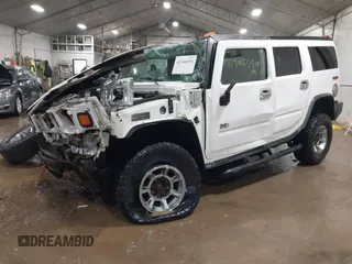 2004 Hummer H2 with VIN 5GRGN23U24H114260, listed as a IAAI auction lot 41346559 with 1 mi miles. Bid and sale history available at carsss.com. Image 2.