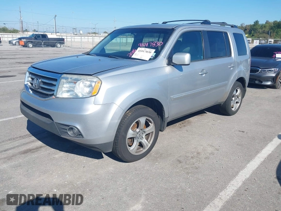 2015 Honda Pilot EX-L with VIN 5FNYF3H69FB001265, listed as a IAAI auction lot 41017830 with 188,572 mi miles and . Bid and sale history available at carsss.com. Image 17.