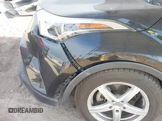 2019 Toyota C-HR XLE with VIN JTNKHMBX4K1032039, listed as a IAAI auction lot 41365721 with 96,194 mi miles. Bid and sale history available at carsss.com. Image 6.