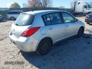 2009 Nissan Versa 1.8 SL with VIN 3N1BC13E09L393563, listed as a IAAI auction lot 41977998 with 163,072 mi miles. Bid and sale history available at carsss.com. Image 4.