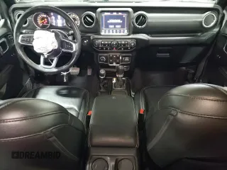 2022 Jeep Wrangler Unlimited Sahara Altitude with VIN 1C4HJXEG4NW248402, listed as a Copart auction lot 63052465 with 36,732 mi miles and Salvage title. Bid and sale history available at DreamBid. Image 8.