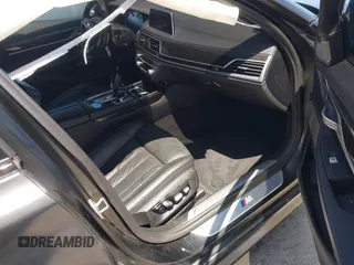 2018 BMW 7 Series 750i with VIN WBA7F0C51JGM23504, listed as a IAAI auction lot 39379378 with 82,251 mi miles. Bid and sale history available at carsss.com. Image 5.