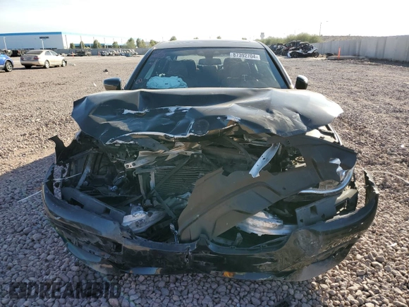 2018 BMW 7 Series 750i with VIN WBA7F0C57JGM23040, listed as a Copart auction lot 87392704 with 0 mi miles and Salvage Title. Bid and sale history available at carsss.com. Image 5.