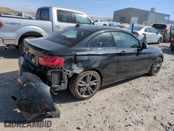 2015 BMW 2 Series M235i xDrive with VIN WBA1J9C5XFV371057, listed as a Copart auction lot 51994765 with 189,788 mi miles and Salvage Title. Bid and sale history available at carsss.com. Image 3.