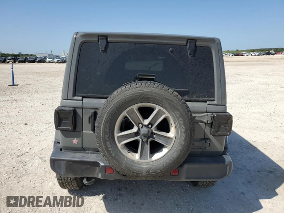 2022 Jeep Wrangler Unlimited Sahara with VIN 1C4HJXEG8NW164969, listed as a Copart auction lot 52241645 with 64,263 mi miles and Salvage title. Bid and sale history available at DreamBid. Image 6.