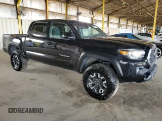2022 Toyota Tacoma SR with VIN 3TMCZ5AN0NM475548, listed as a Copart auction lot 59152015 with 56,020 mi miles and Salvage title. Bid and sale history available at DreamBid. Image 4.