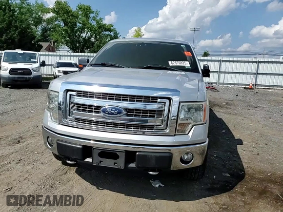 2014 Ford F-150 XL with VIN 1FTFW1EF7EKF51839, listed as a Copart auction lot 62570825 with 235,238 mi miles and Salvage title. Bid and sale history available at DreamBid. Image 13.