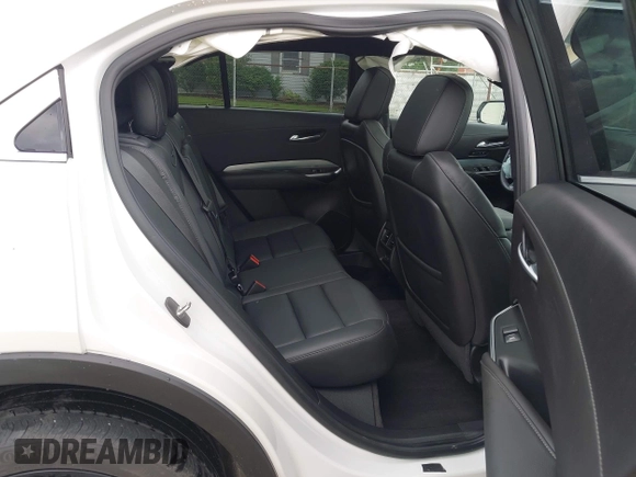 2022 Cadillac XT4 AWD Premium Luxury z VIN 1GYFZDR42NF128199, wystawiony jako IAAI lot #42522314 z przebiegiem 29 002 mil mil oraz . Historia ofert i sprzedaży dostępna na DreamBid. Obrazek 8.