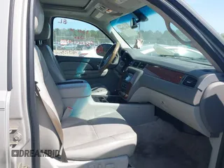 2007 Chevrolet Suburban LS with VIN 1GNFC16087J239886, listed as a IAAI auction lot 41874548 with 303,014 mi miles and . Bid and sale history available at DreamBid. Image 5.