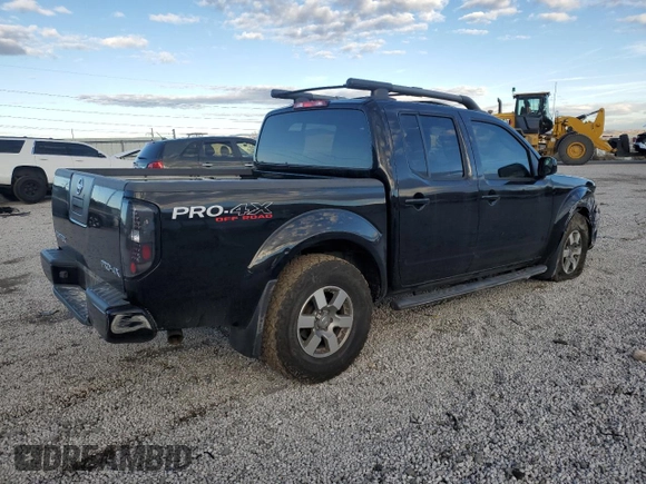 2011 Nissan Frontier Pro-4X with VIN 1N6AD0EV8BC427339, listed as a Copart auction lot 88293455 with 99,856 mi miles and Salvage title. Bid and sale history available at DreamBid. Image 3.