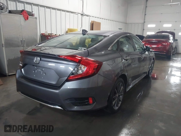 2020 Honda Civic EX-L with VIN 19XFC1F70LE010163, listed as a IAAI auction lot 41306532 with 88,767 mi miles and . Bid and sale history available at DreamBid. Image 4.