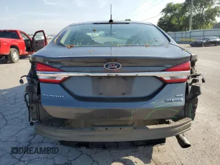 2017 Ford Fusion Hybrid SE с VIN 3FA6P0LU3HR287520, выставлен на аукционе Copart как лот 63519315 с пробегом 101 156 миль миль и Списание • Salvage title. История ставок и продаж доступна на DreamBid. Изображение 6.