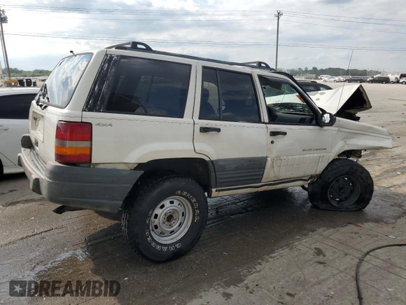 1996 Jeep Grand Cherokee Laredo with VIN 1J4GZ58S9TC277492, listed as a Copart auction lot 66732404 with Not provided miles and Salvage title. Bid and sale history available at DreamBid. Image 3.