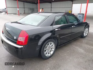 2005 Chrysler 300 with VIN 2C3AA63H45H674987, listed as a IAAI auction lot 41560730 with 101,659 mi miles. Bid and sale history available at carsss.com. Image 4.
