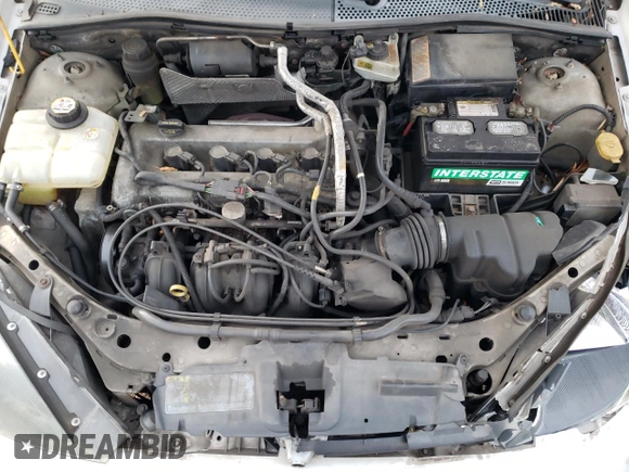 2004 Ford Focus with VIN 3FAFP37Z94R105076, listed as a Copart auction lot 82924224 with 218,253 mi miles and Clean title. Bid and sale history available at DreamBid. Image 12.