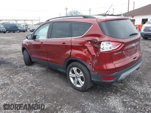 2016 Ford Escape SE with VIN 1FMCU9GX8GUB28820, listed as a IAAI auction lot 40874359 with 134,459 mi miles. Bid and sale history available at carsss.com. Image 3.