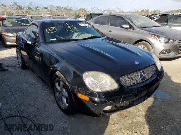 2001 Mercedes-Benz SLK-Class with VIN WDBKK65F51F217396, listed as a Copart auction lot 74339214 with 56,281 mi miles and Salvage Title. Bid and sale history available at carsss.com. Image 4.