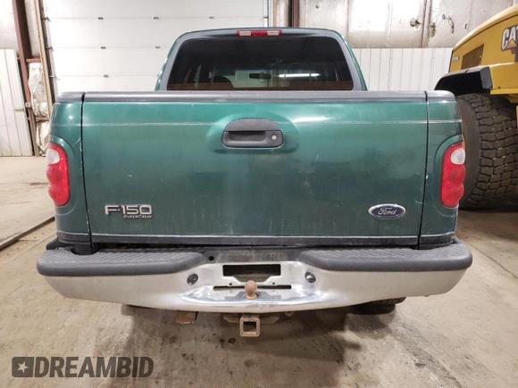 2001 Ford F-150 XLT with VIN 1FTRW08W41KD98737, listed as a Copart auction lot 64695065 with 179,158 mi miles and Clean title. Bid and sale history available at DreamBid. Image 6.