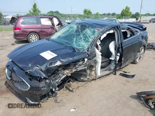 2019 Ford Fusion Titanium with VIN 3FA6P0D92KR247270, listed as a IAAI auction lot 42474803 with Not provided miles and . Bid and sale history available at DreamBid. Image 16.