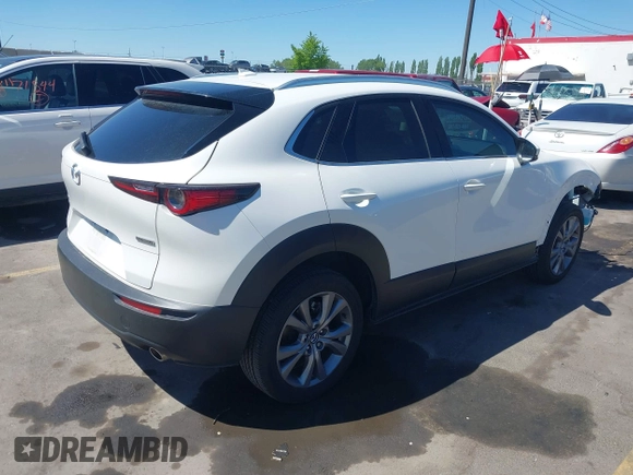 2024 Mazda CX-30 S Premium with VIN 3MVDMBDM8RM633580, listed as a IAAI auction lot 42152915 with 18,679 mi miles and . Bid and sale history available at DreamBid. Image 4.