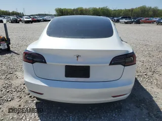 2023 Tesla Model 3 with VIN 5YJ3E1EA3PF602067, listed as a Copart auction lot 52317695 with 54,867 mi miles and Salvage Title. Bid and sale history available at DreamBid. Image 6.