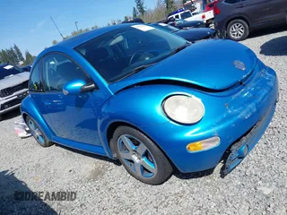 2004 Volkswagen New Beetle Coupe Satellite Blue with VIN 3VWGK31C14M420613, listed as a IAAI auction lot 42046048 with 117,274 mi miles. Bid and sale history available at carsss.com. Image 1.