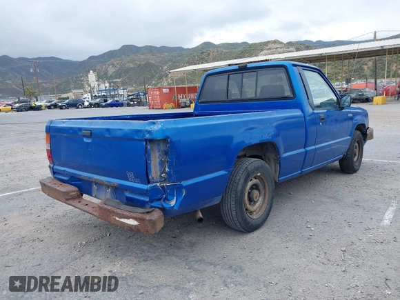 1990 Mitsubishi Mighty Max with VIN JA7FL24W8LP030657, listed as a IAAI auction lot 42014231 with 376,787 mi miles and . Bid and sale history available at DreamBid. Image 4.