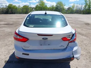 2013 Ford Focus SE with VIN 1FADP3F23DL218239, listed as a IAAI auction lot 42331440 with 156,501 mi miles and . Bid and sale history available at DreamBid. Image 17.