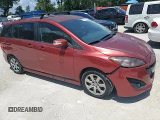 2013 Mazda 5 Touring z VIN JM1CW2CL2D0159718, wystawiony jako Copart lot #61245655 z przebiegiem 143 012 mil mil oraz Czysty tytuł • Clean title. Historia ofert i sprzedaży dostępna na DreamBid. Obrazek 4.